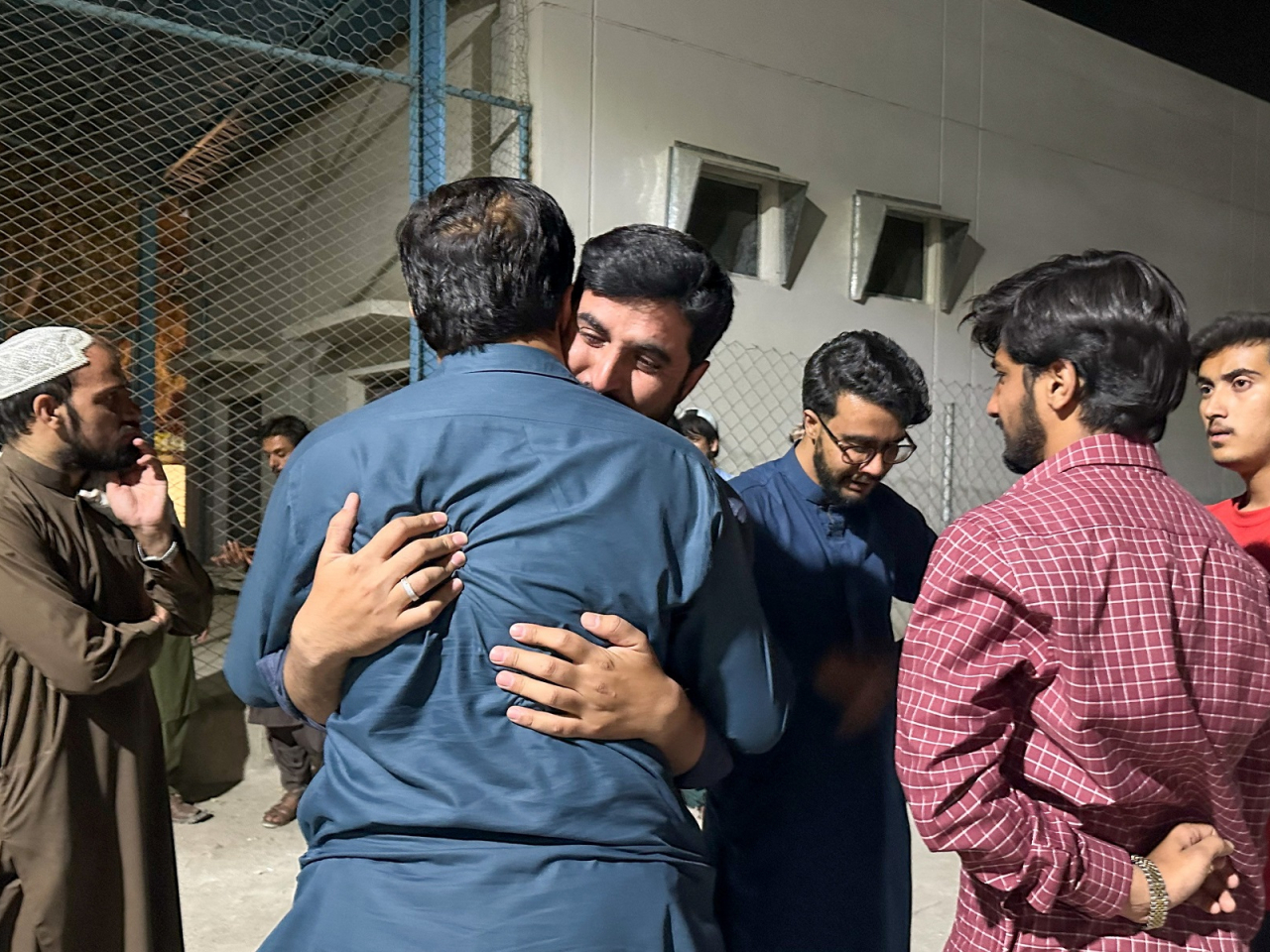 Men mourn the death of a relative, who was killed in a bomb blast at the public rally in Quetta, at hospital premises in Quetta. Photo: Reuters