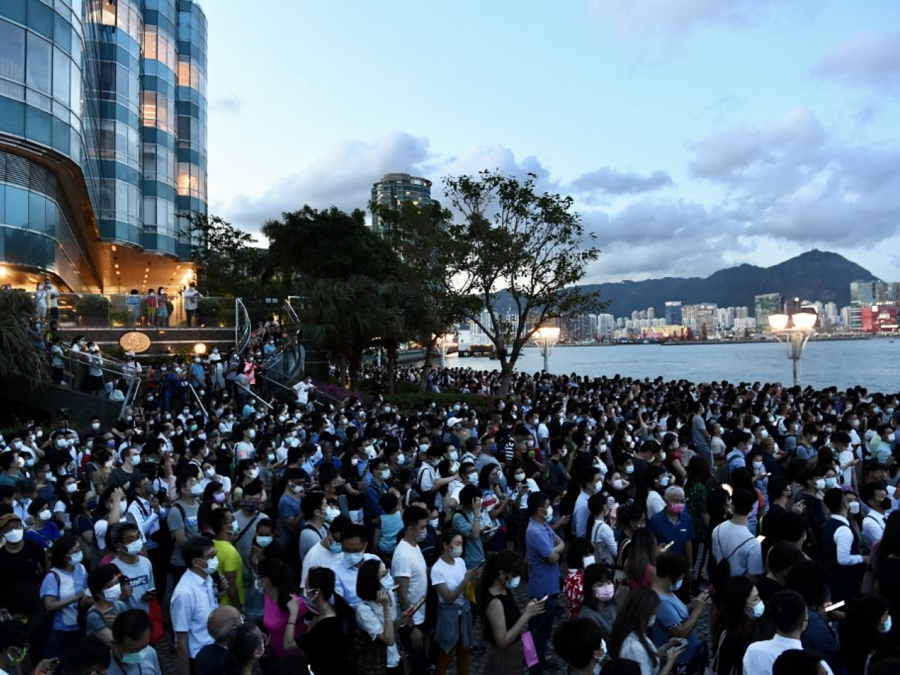 Large crowds flocked to both sides of the harbour in Hong Kong to watch the 'super blood moon' in May 2021. File photo: AFP