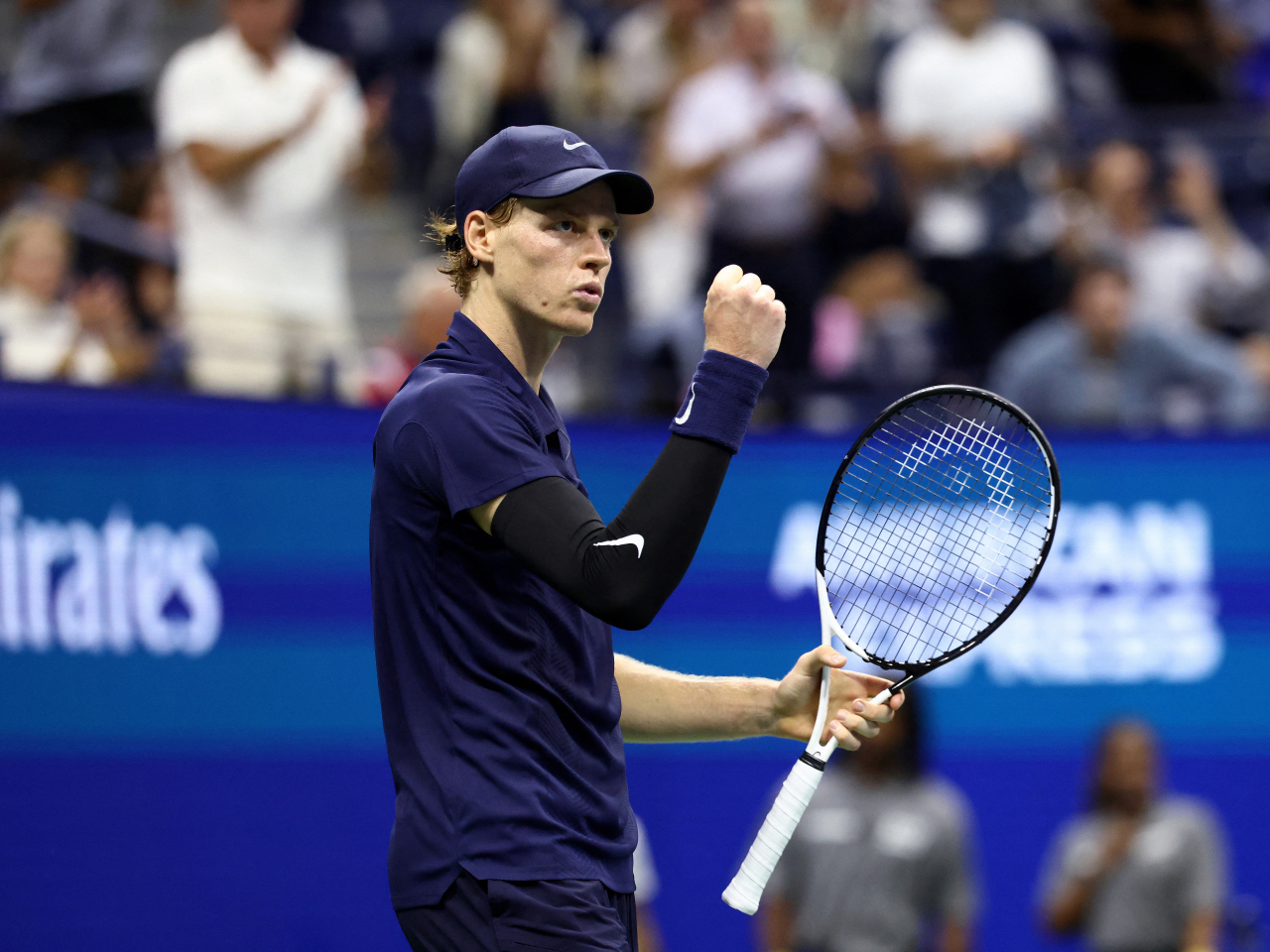 Jannik Sinner signals job done to his team after blowing past Felix Auger-Aliassime at Flushing Meadows. Photo: Reuters