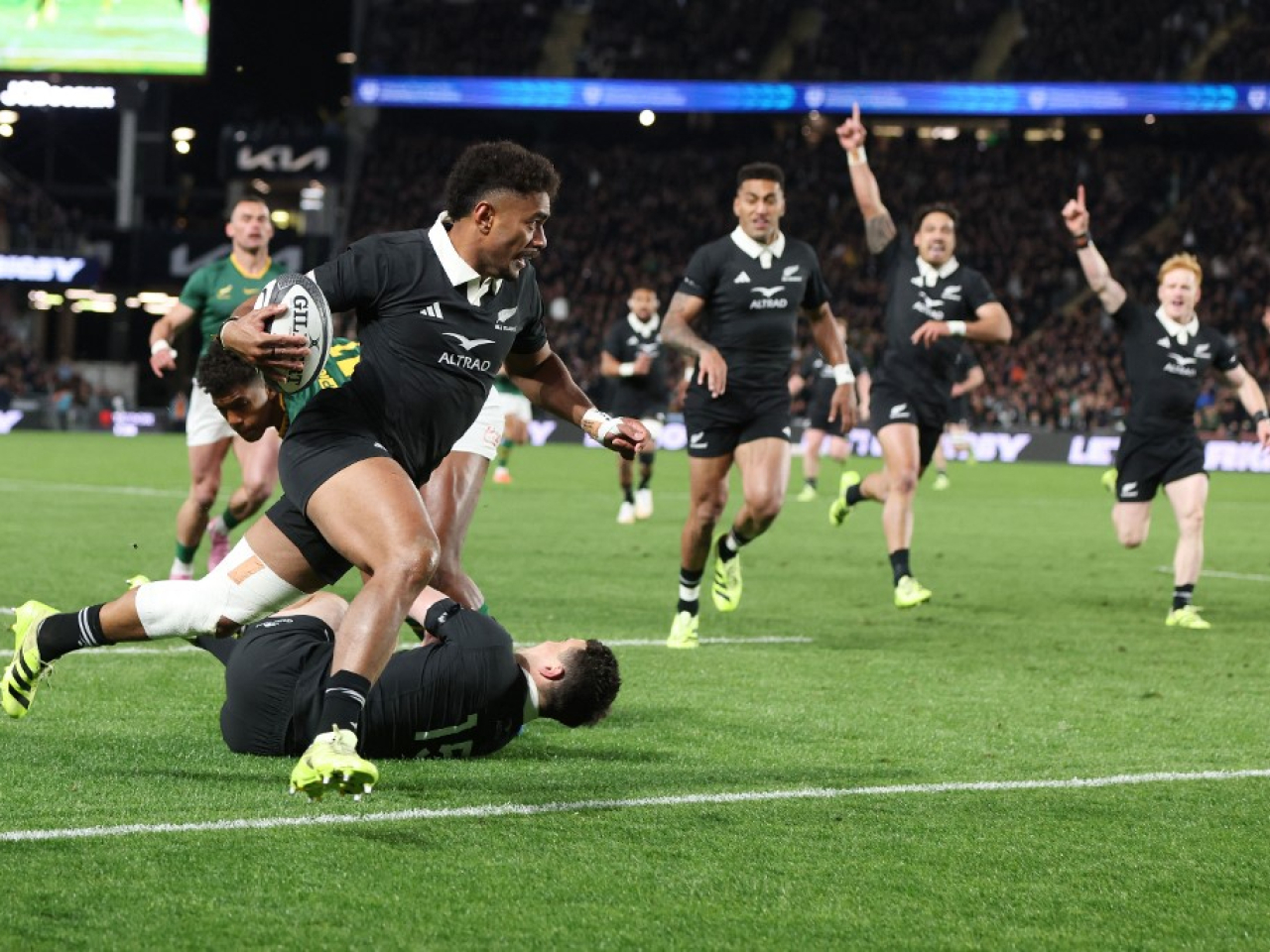 Emoni Narawa runs in a try for the All Blacks during the Rugby Championship Test match against South Africa at Eden Park in Auckland. Photo: AFP