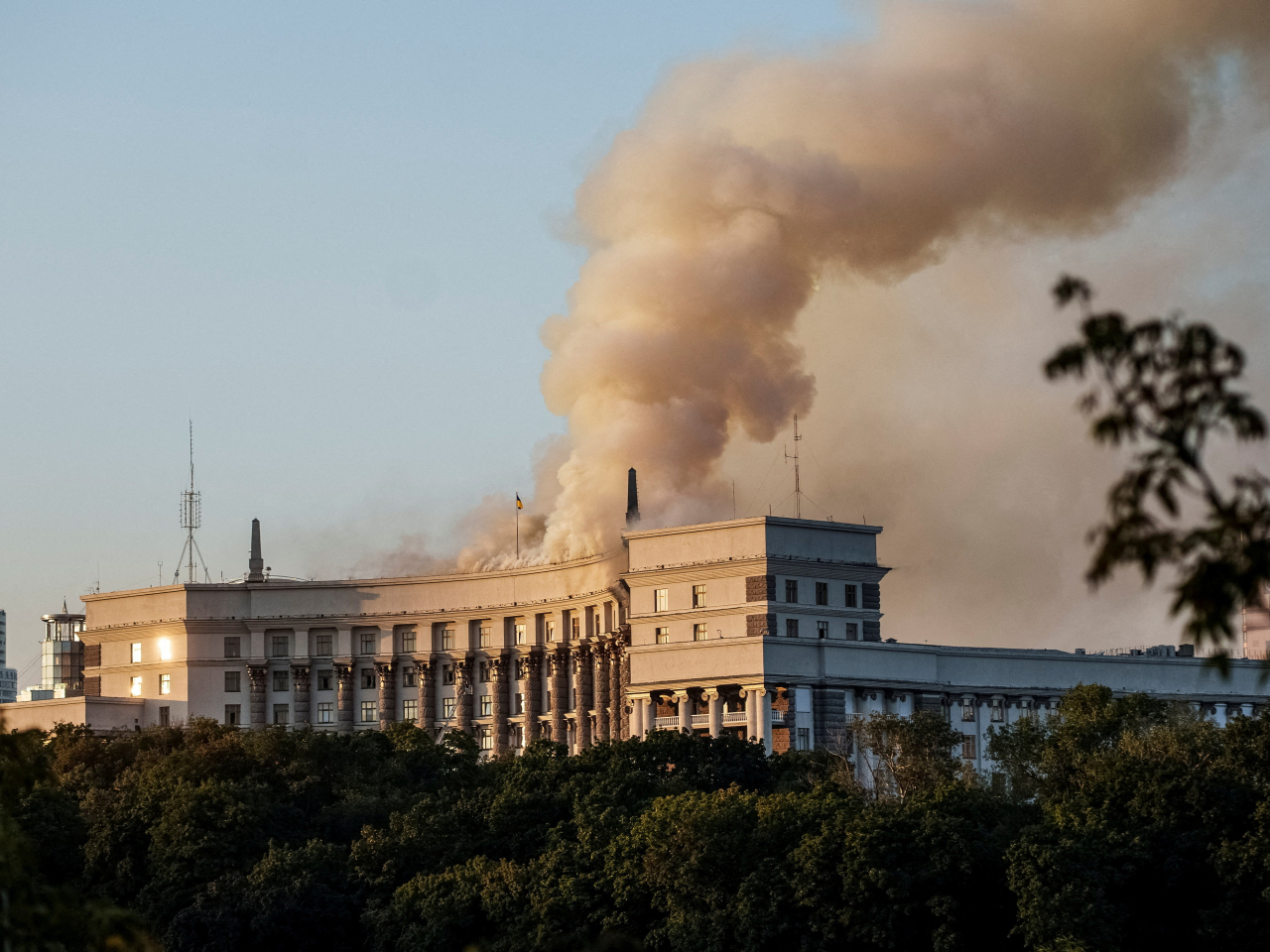 Smoke rises over a building of the Ukrainian government headquarters after the latest Russian attack. Photo: Reuters