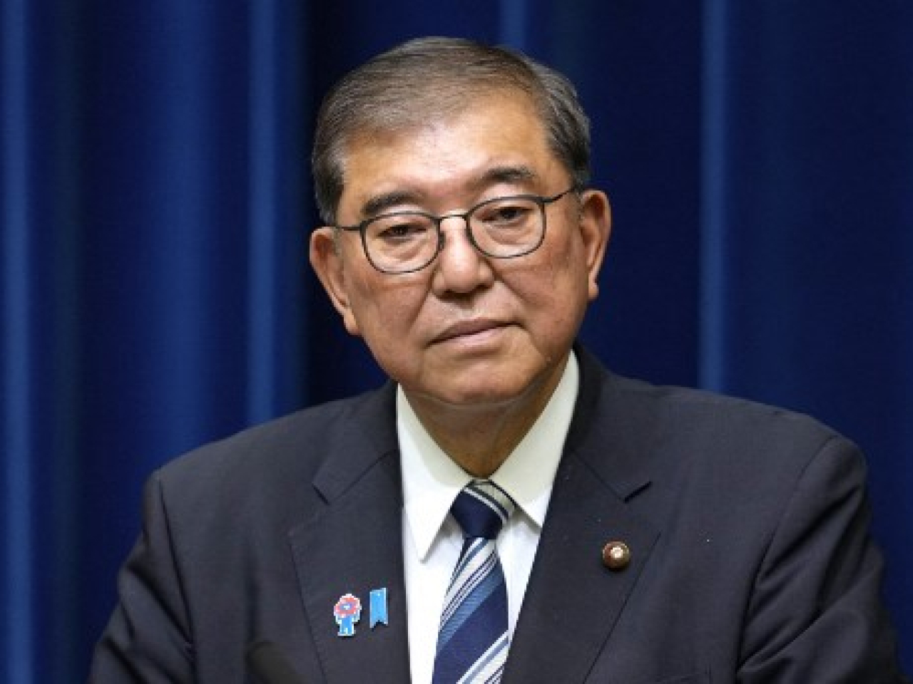 Shigeru Ishiba says during a televised press conference that he would start a process to hold a party leadership vote to choose his replacement. Photo: AFP
