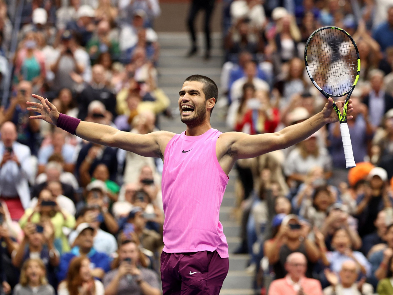 Spain's Carlos Alcaraz celebrates winning the men's singles final against Italy's Jannik Sinner