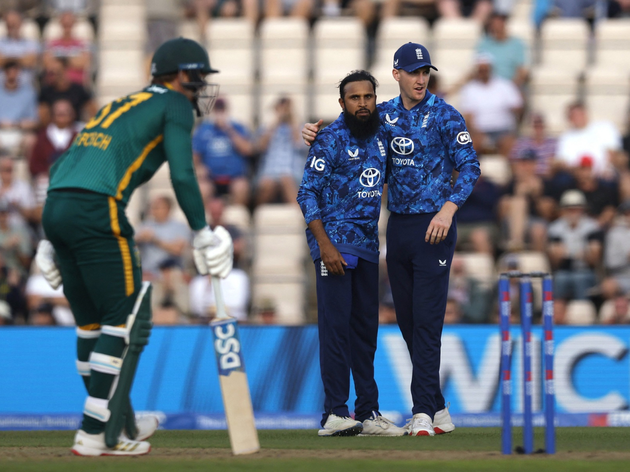 England's Adil Rashid celebrates after taking the wicket of South Africa's Corbin Bosch to win the match. Photo: Reuters