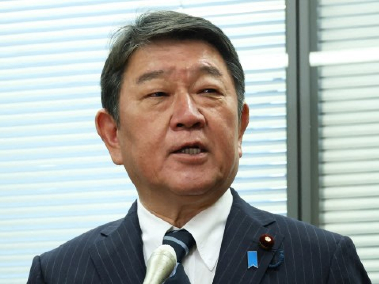 茂木敏充表態參選，稱將貢獻在黨內和政府積累的經驗。（法新社）