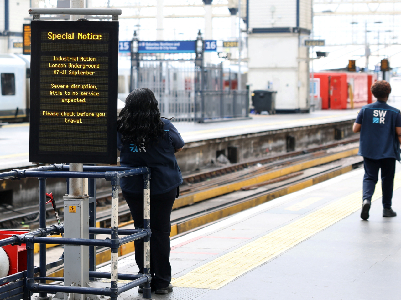 A sign warns of service disruptions at Waterloo Station on Monday. Photo: Reuters