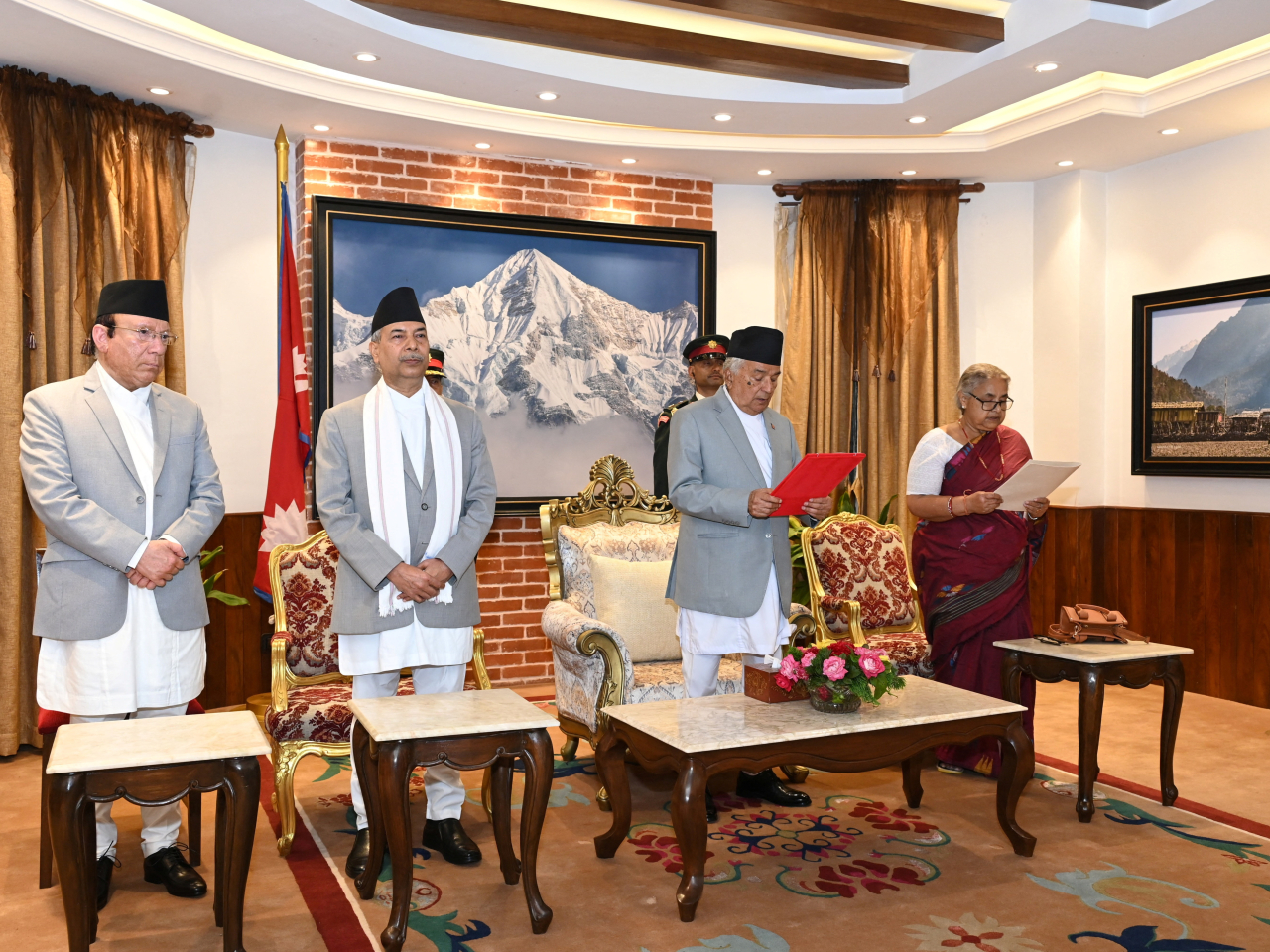 Nepal’s President Ramchandra Paudel administers the oath of office to Sushila Karki. Photo: Reuters