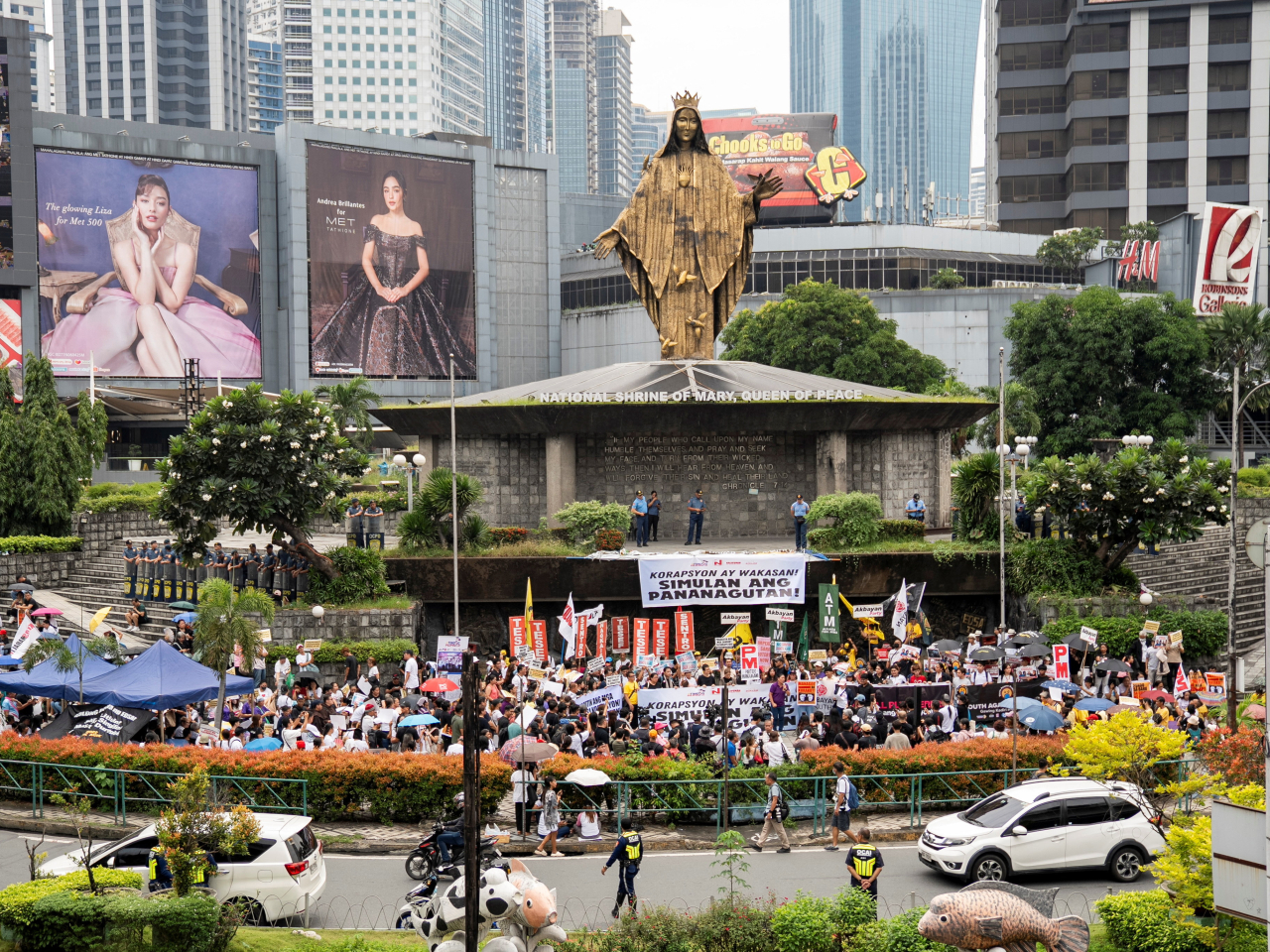 Filipinos gather to denounce corruption in a Quezon City protest in Metro Manila on Thursday. Photo: Reuters