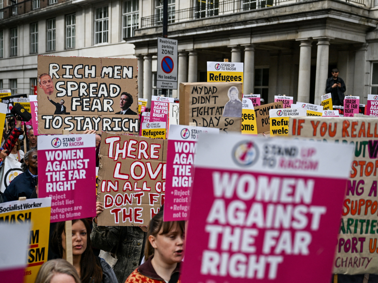 Members of Stand Up to Racism campaign group protest against an anti-immigration rally organised by Tommy Robinson. Photo: Reuters