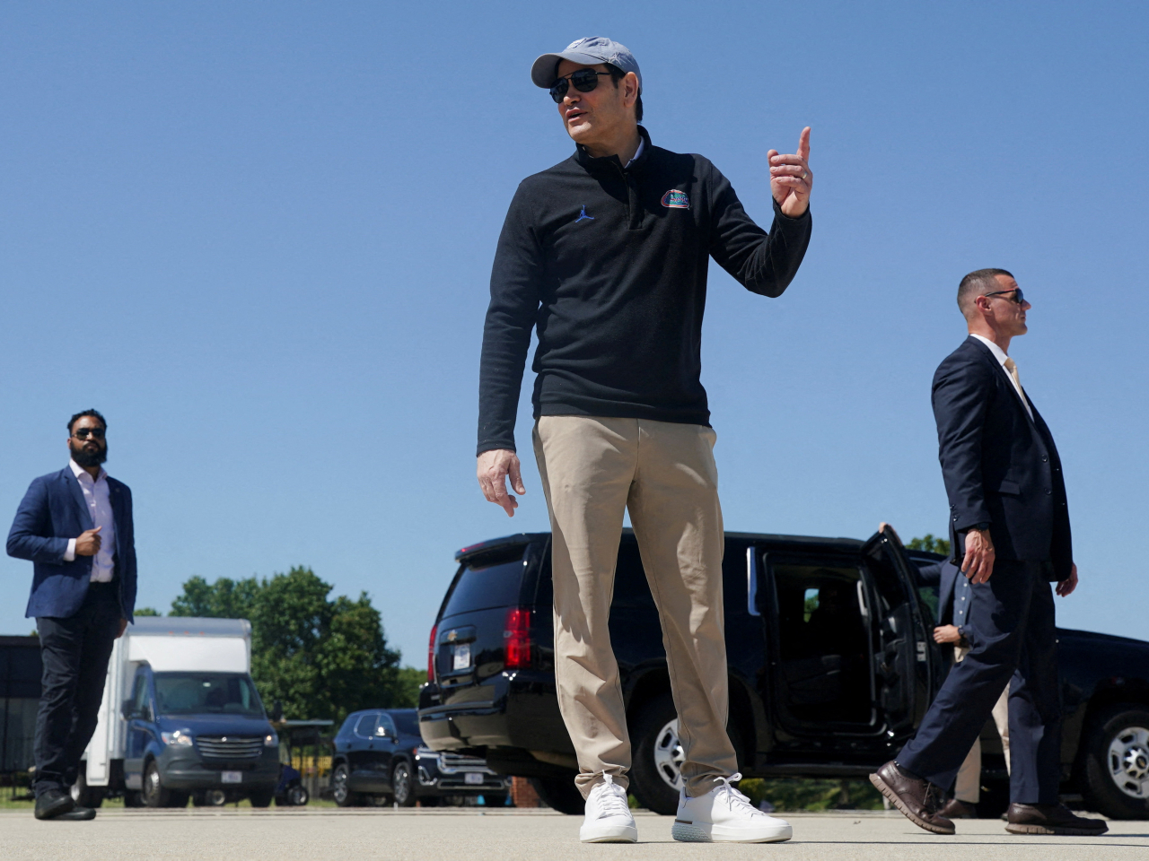 US Secretary of State Marco Rubio points as he stands on the tarmac, before departing for Israel at Joint Base Andrews. Photo: Reuters