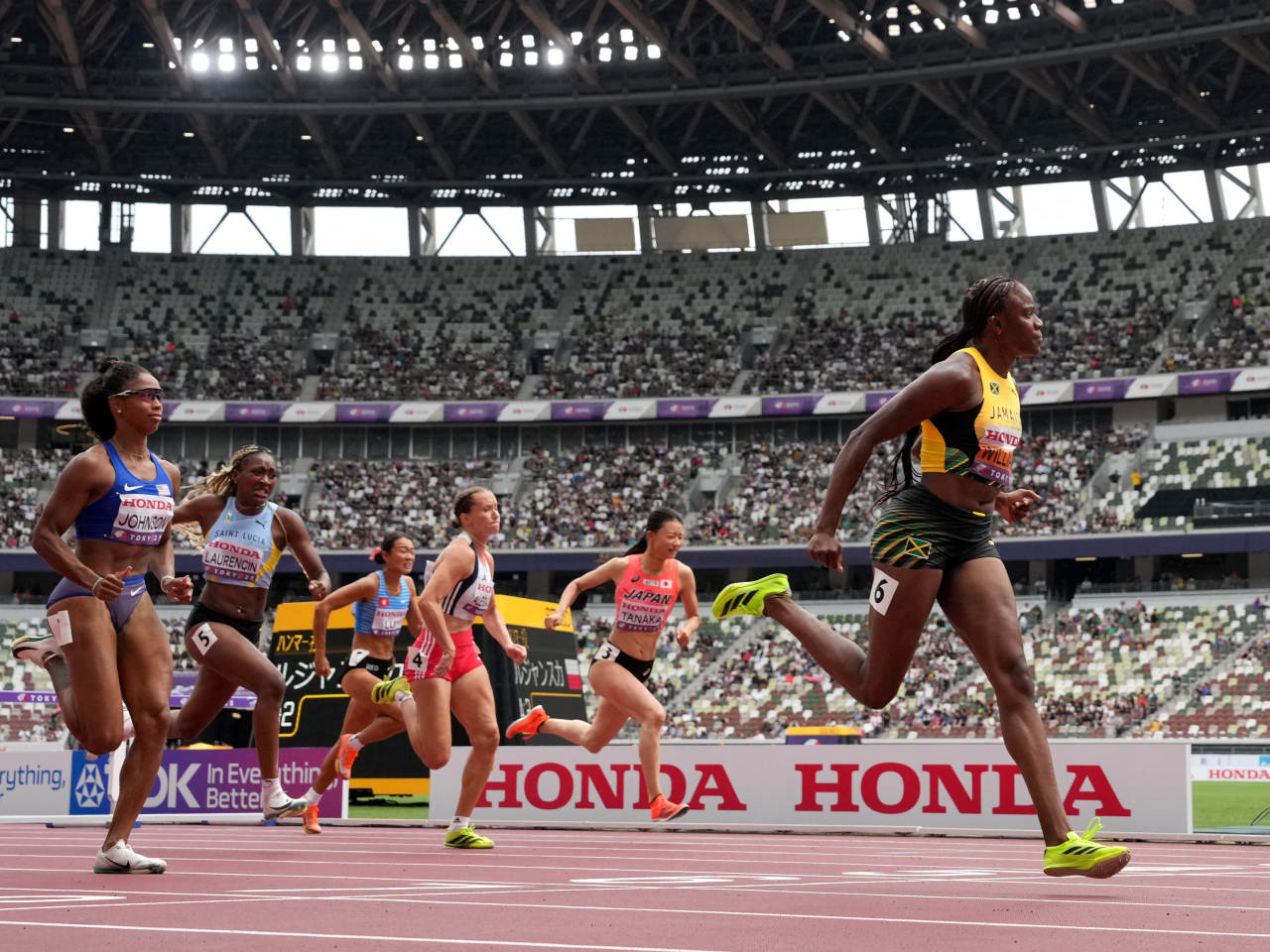 Lui Lai-yiu, third left, finished 7th in her heat won by Jamaica's Danielle Williams. Photo: Reuters
