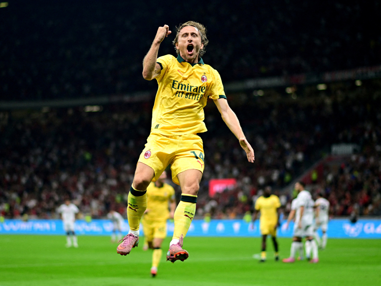 Photo caption: Luka Modric celebrates after scoring his first goal with Serie A side AC Milan. Photo: Reuters