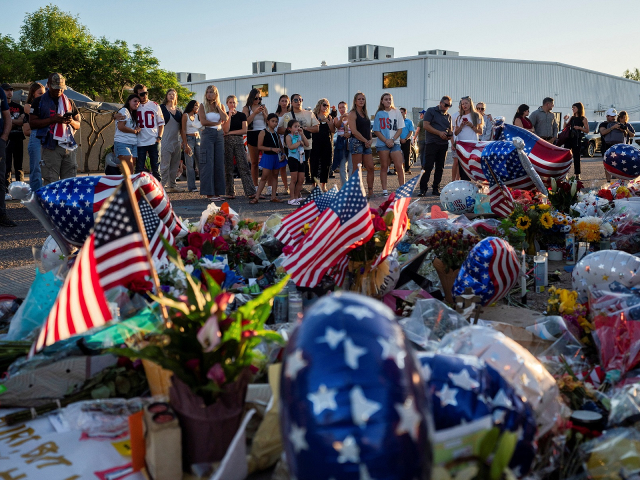 People mourn following the fatal shooting of Charlie Kirk at the Turning Point USA headquarters in Phoenix, Arizona. Photo: Reuters