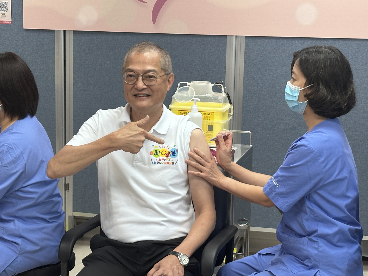 Secretary for Health Lo Chung-mau received the Sinovac flu vaccine at a government clinic. Photo: RTHK