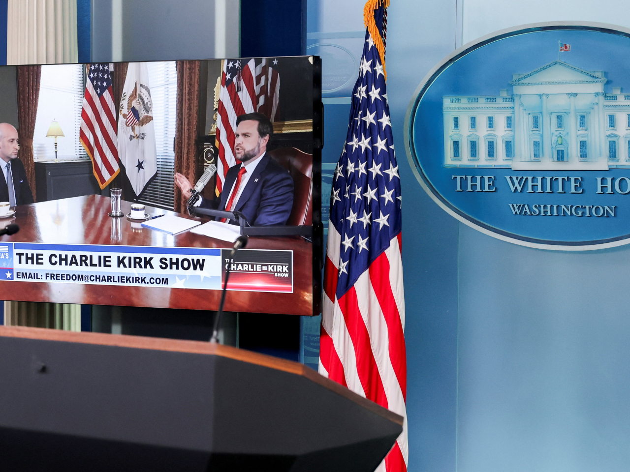 J D Vance, right, is joined by Stephen Miller on the late Charlie Kirk's podcast in the White House. Photo: Reuters