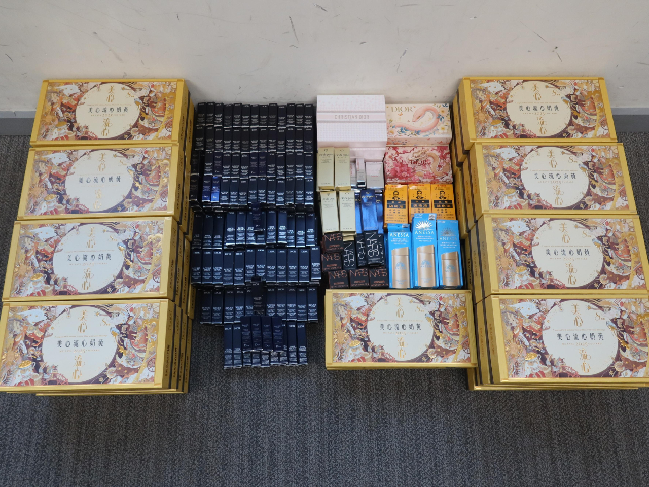Customs officers displayed some of the goods they seized during the operation. Photo courtesy of Information Services Dept.
