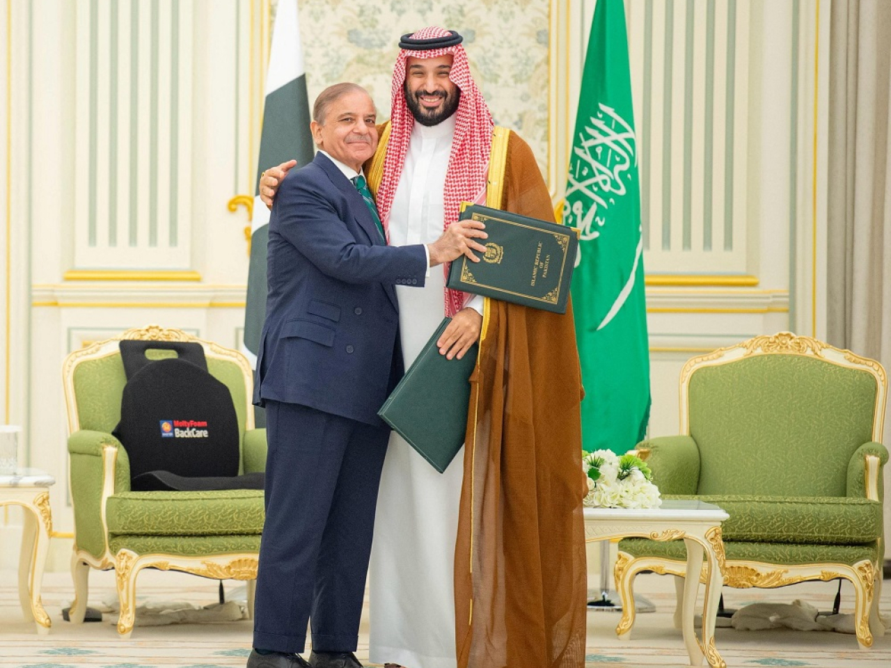 Saudi Crown Prince Mohammed bin Salman and Pakistan Prime Minister Shehbaz Sharif embrace after signing the defence agreement. Photo: Reuters