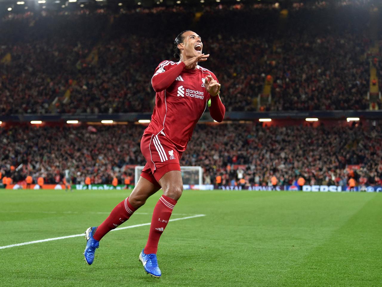 Liverpool skipper Virgil van Dijk scored deep into stoppage time to seal victory over Atletico Madrid. Photo: Reuters