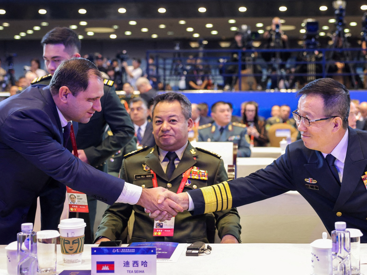 Armenia’s Defence Minister Suren Papikyan shakes hands with Defence Minister Dong Jun at the Beijing Xiangshan Forum. Photo: Reuters