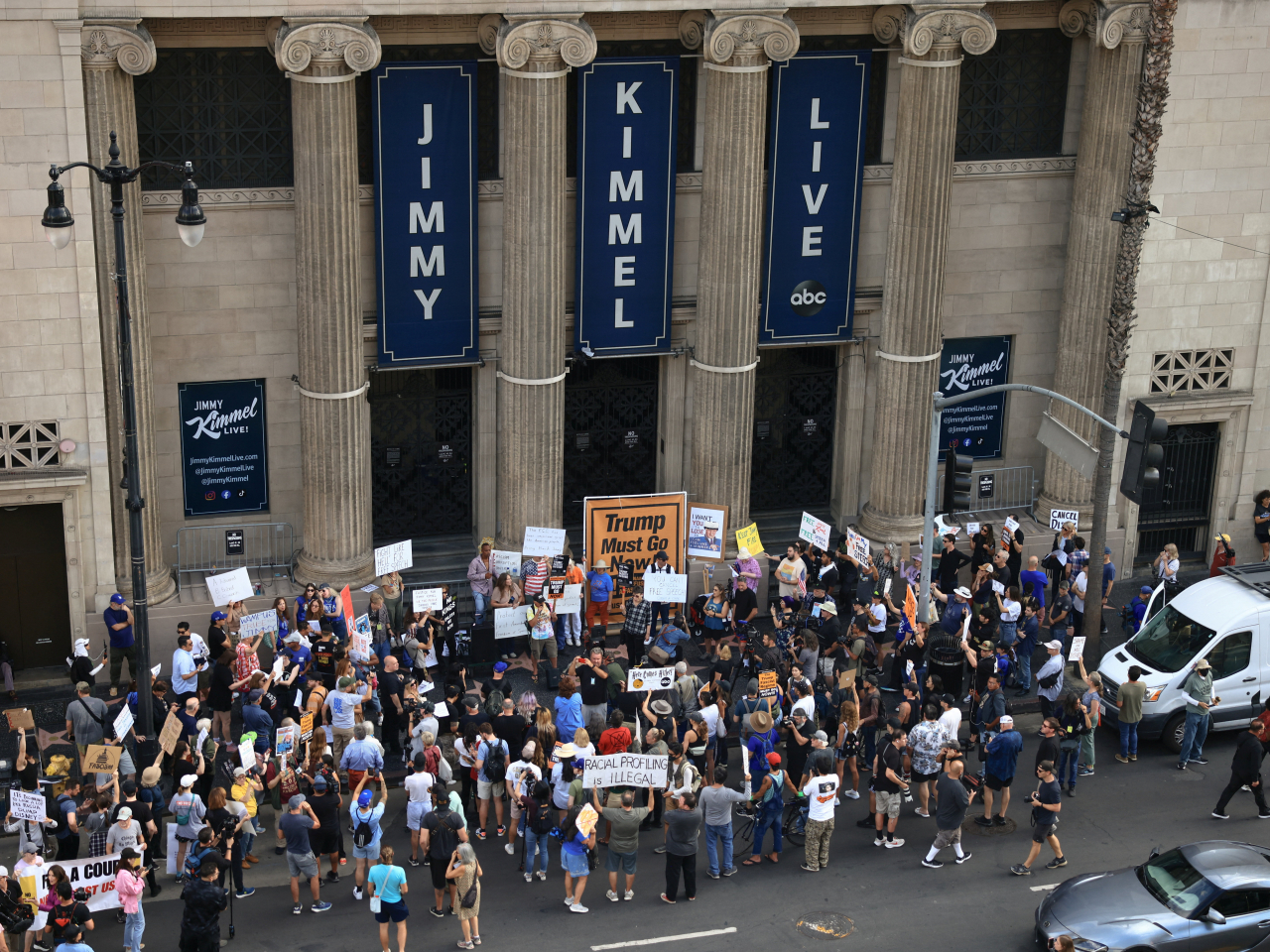 Protesters make their feelings known at the El Capitan Entertainment Centre, where 'Jimmy Kimmel Live!' is usually recorded for broadcast following the comedian's suspension. Photo: Reuters