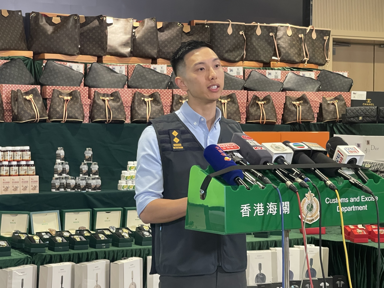 Over 9,200 counterfeit products worth HK$15 million have been seized by customs officers. Photo: RTHK