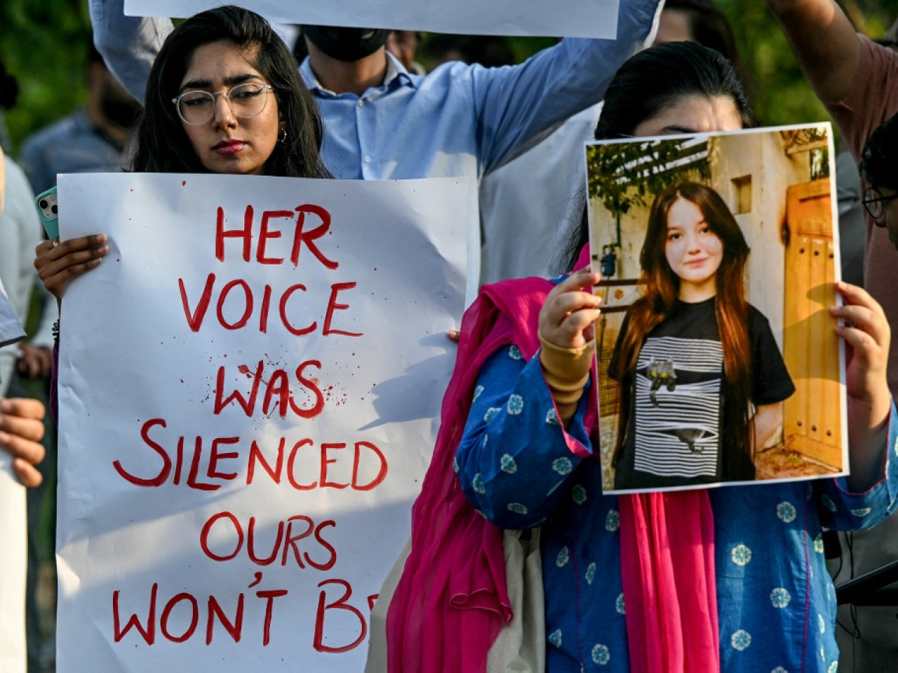 A photograph of Sana Yousaf forms the central focus in an Islamabad protest over her killing. File photo: AFP