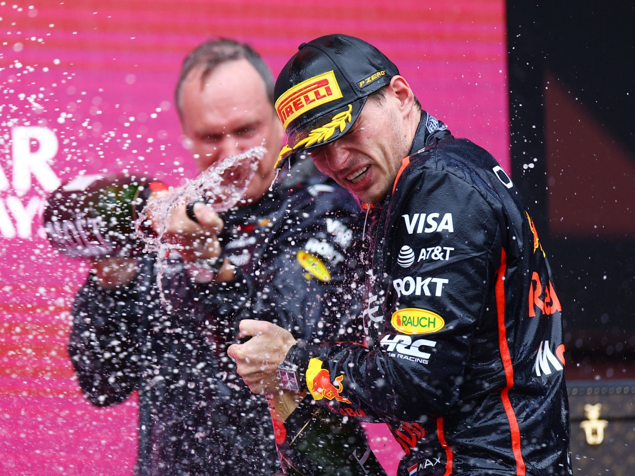 Red Bull's Max Verstappen celebrates on the podium after winning the Azerbaijan Grand Prix. Photo: Reuters