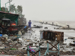 Over 10,000 Filipinos flee homes as storm lashes north