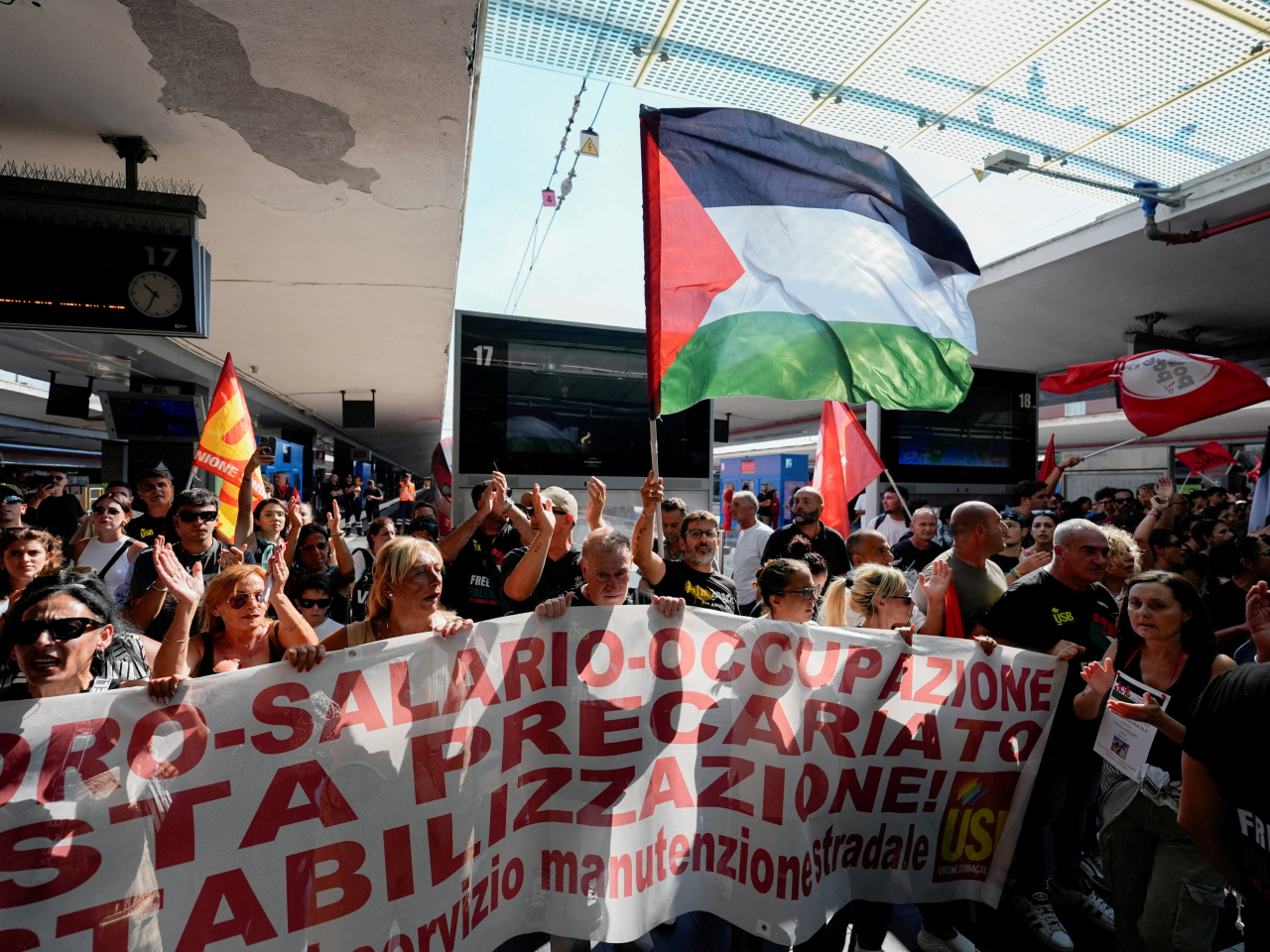 Demonstrators gather at Napoli Centrale railway station during a nationwide strike called by the USB union in solidarity with Gaza. Photo: Reuters
