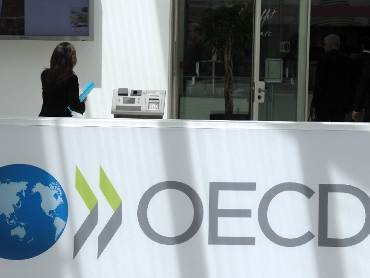 經濟合作暨發展組織（OECD）上調今年全球經濟增長預測，由原先預測的2.9%上調至3.2%。（法新社資料圖片）