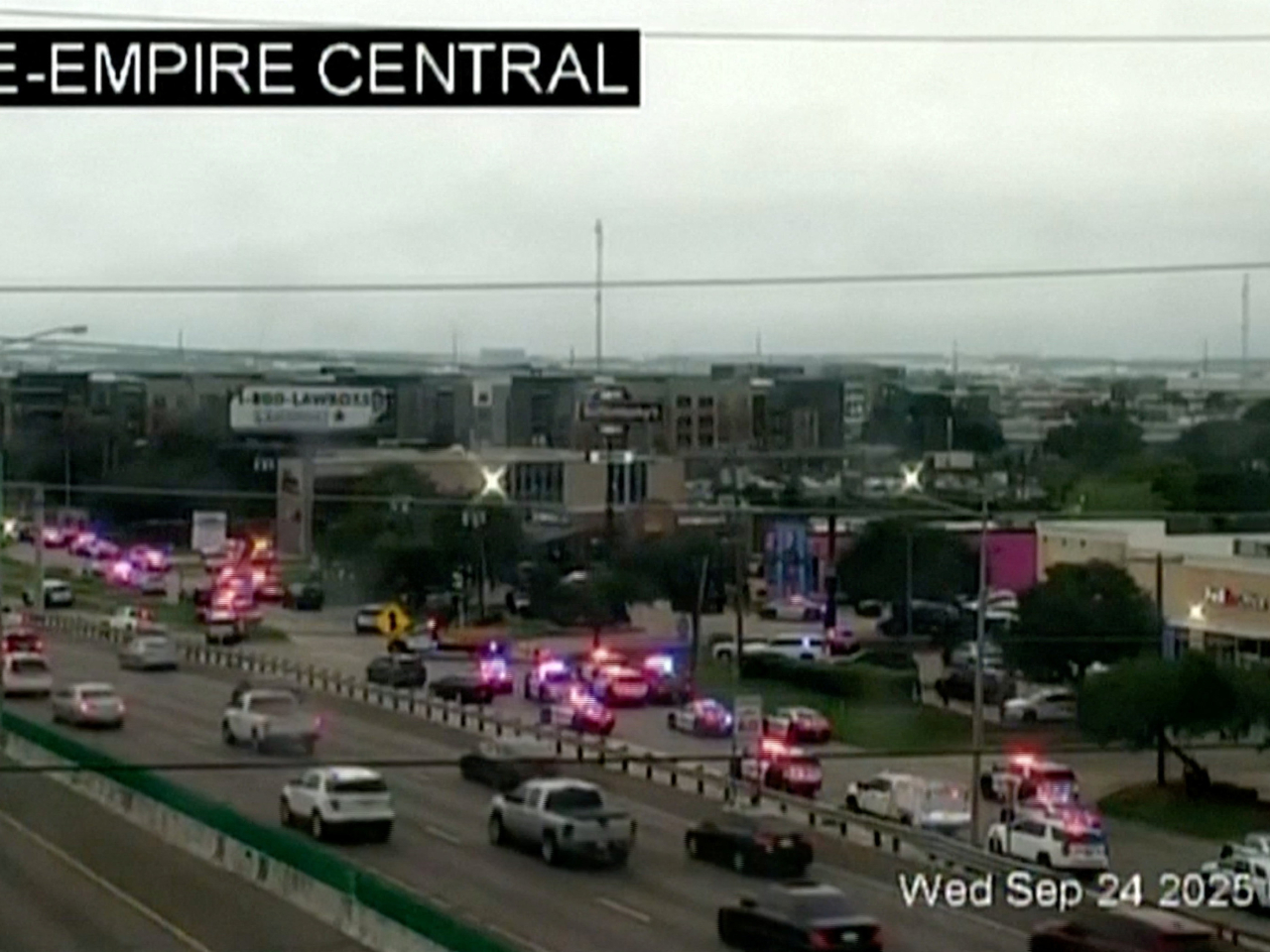 A screengrab from a traffic camera shows police cars and ambulances outside an ICE facility where a shooting took place in Dallas, Texas. Image: Reuters