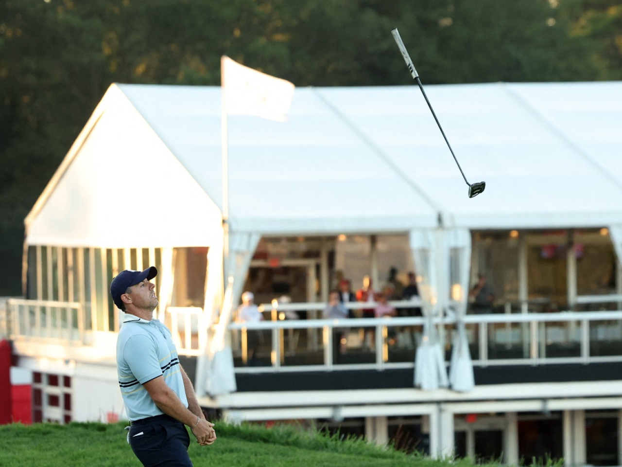 Rory McIlroy shows his frustration after missing a putt on the 18th. Photo: Reuters