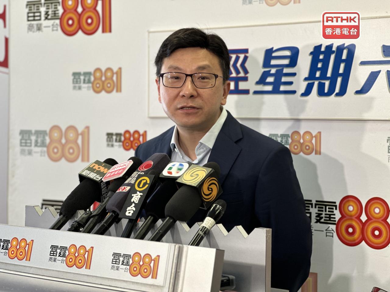 Secretary for Labour and Welfare Chris Sun speaks to reporters after appearing on a radio show. Photo: RTHK