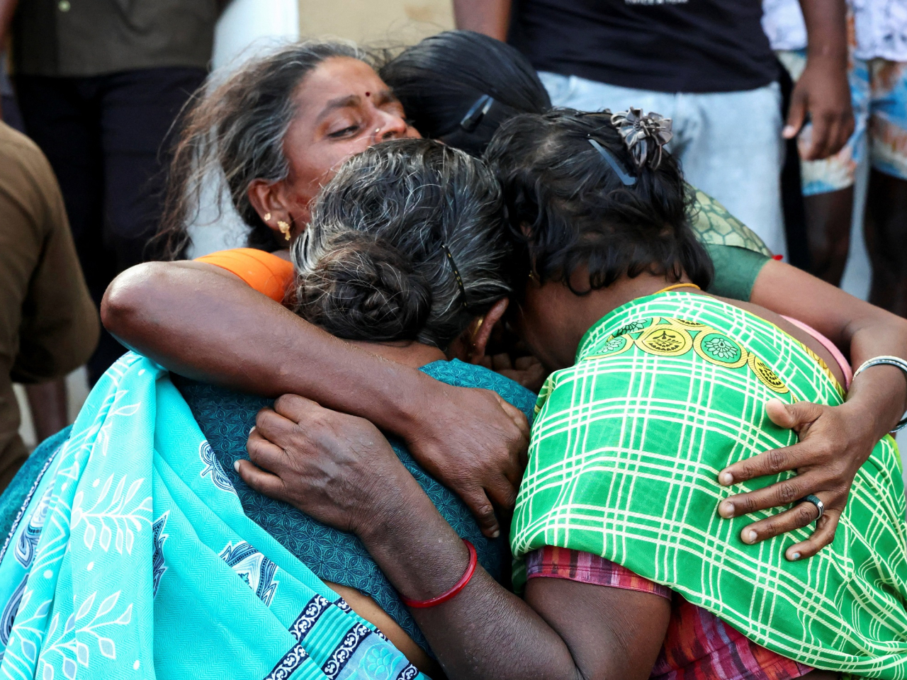 Relatives of the stampede's victims mourn in front of a hospital in Karur district of Tamil Nadu. Photo: Reuters