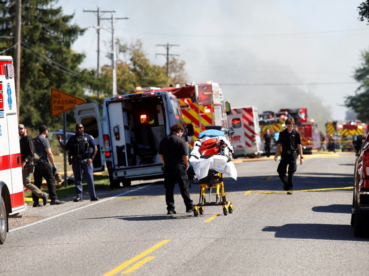 Smoke rises as first responders work at the scene of the shooting, which took place at the Church of Jesus Christ of Latter-day Saints. Photo: Reuters