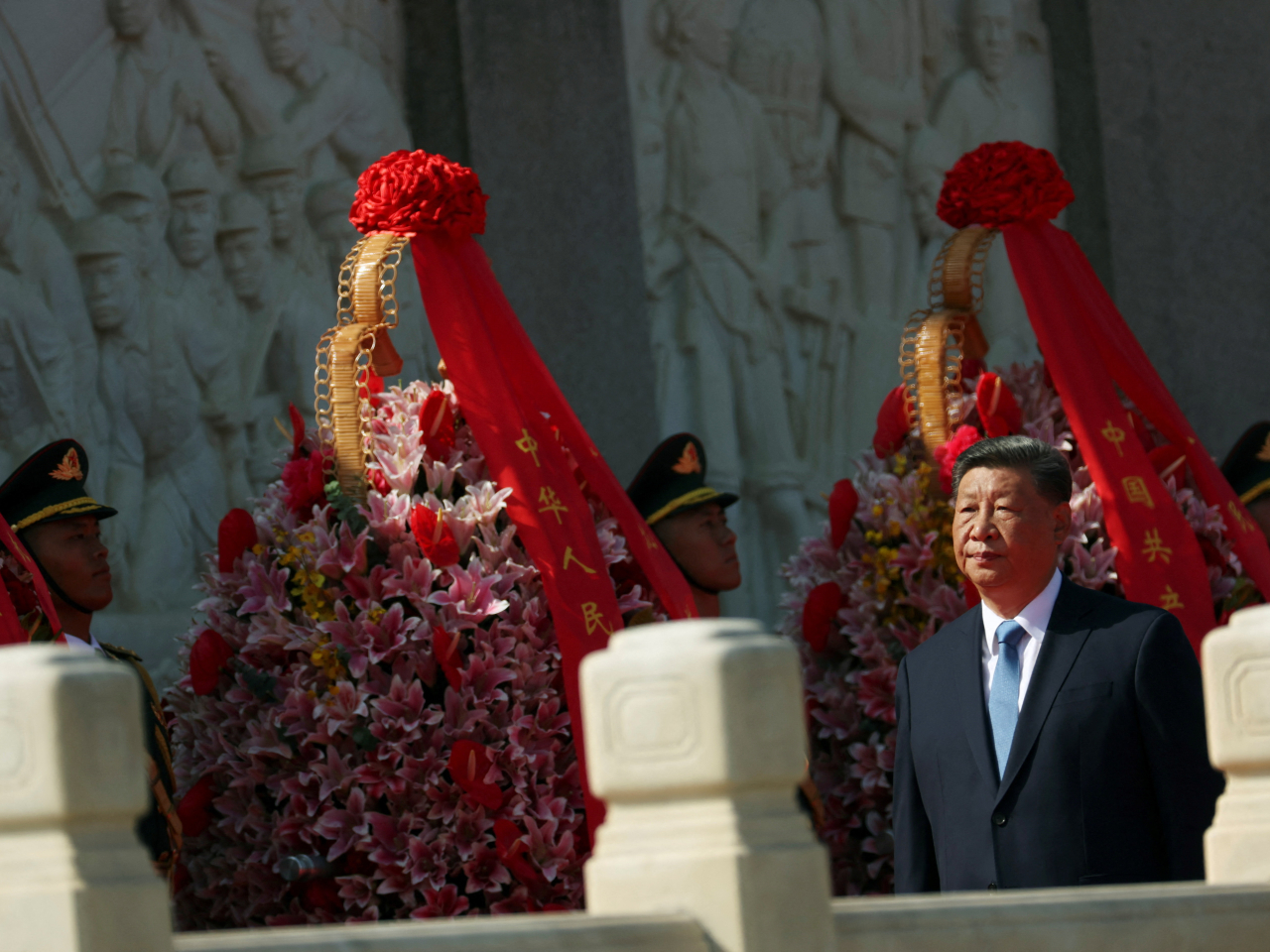 President Xi Jinping at the Monument to the People's Heroes in a ceremony to mark Martyrs' Day, a day ahead of the National Day on Tiananmen Square. Photo: Reuters