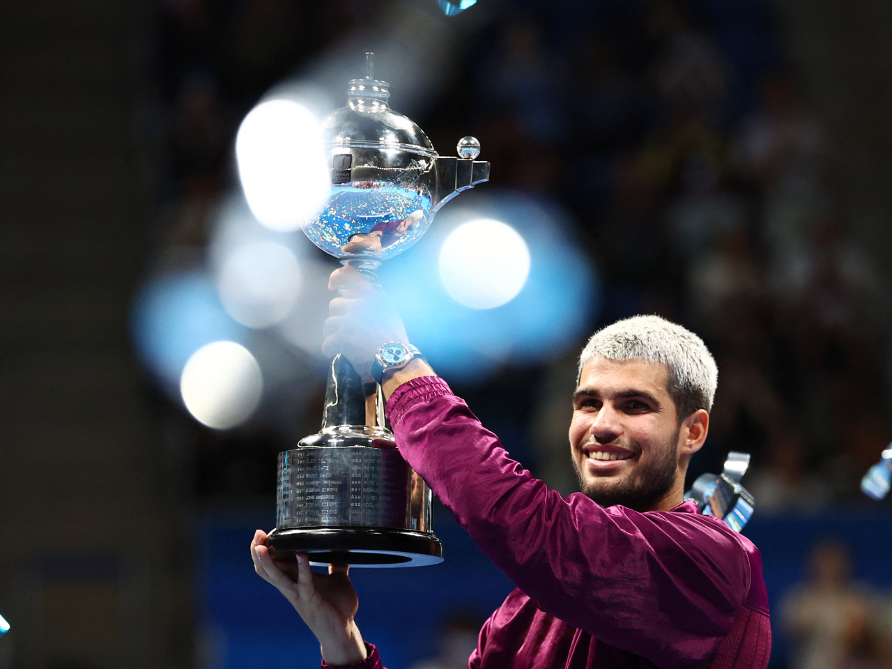 Carlos Alcaraz celebrates after beating Taylor Fritz of the US in the final. Photo: Reuters