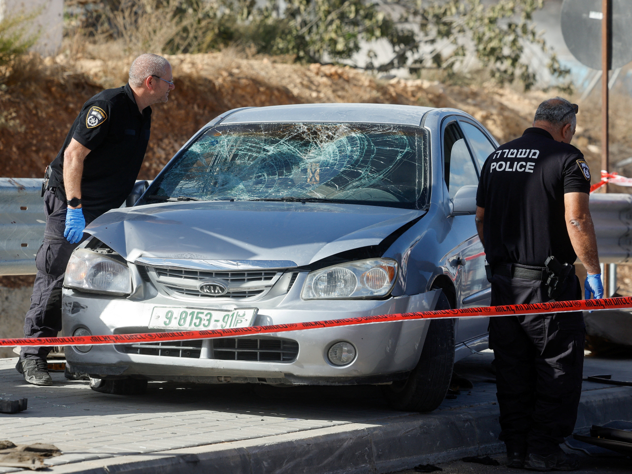 Israeli police inspect the scene of the alleged ramming attack. Photo: Reuters