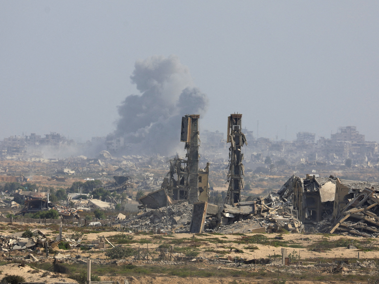Gaza City is hit in an air strike on Saturday in spite of Donald Trump's call for an end to the Israeli bombardment. Photo: Reuters