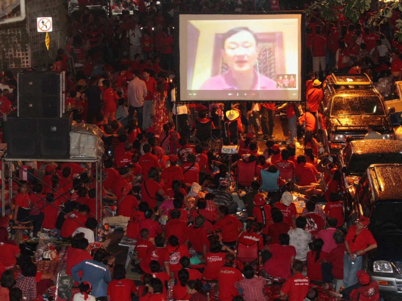 Thaksin Shinawatra addresses, via video link, supporters at Ratchaprasong intersection in 2012. File photo: Bangkok Post via AFP