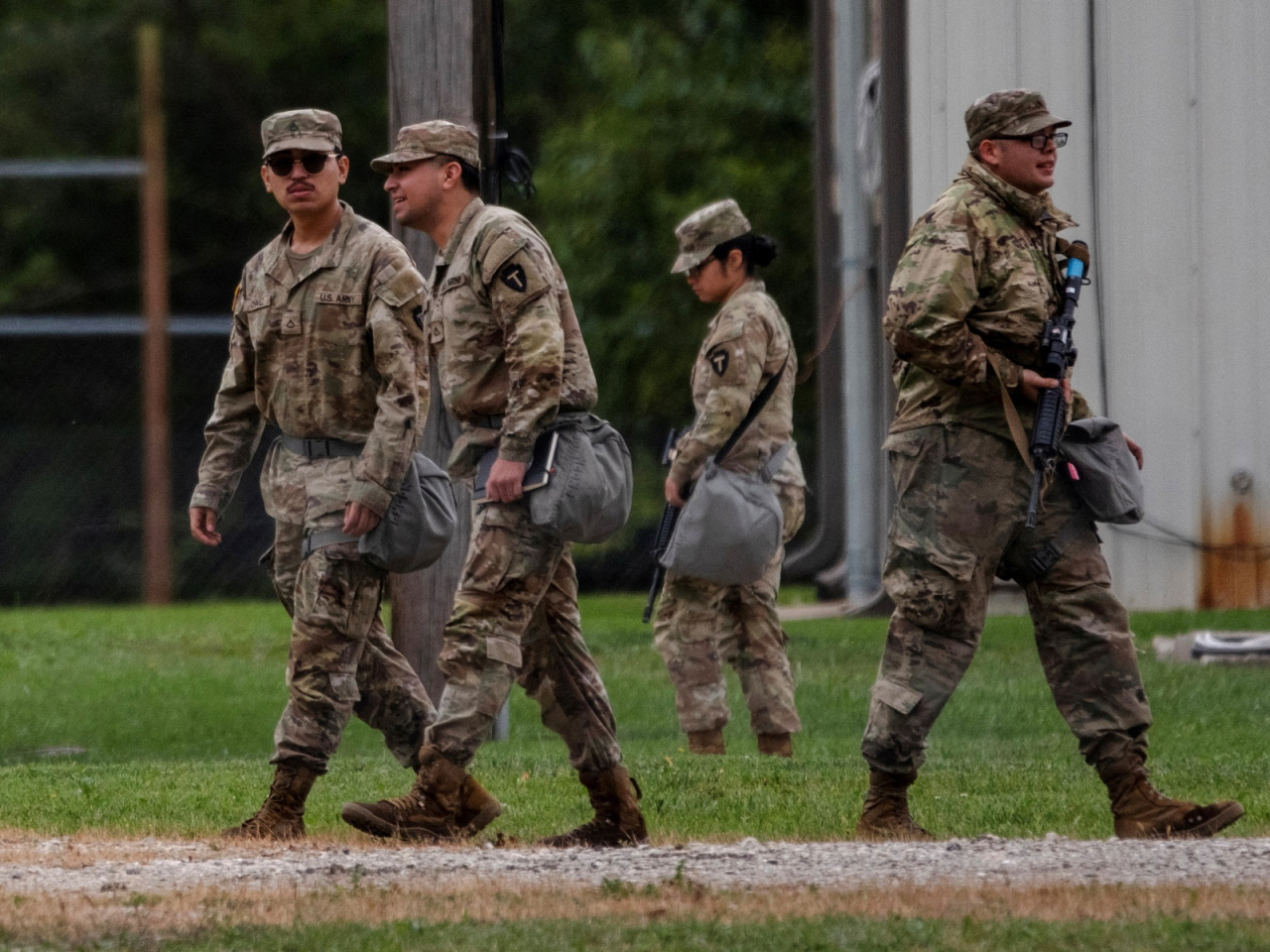 Texas National Guard were deployed to a training centre outside of Chicago as Donald Trump threatened to jail the city's mayor as well as the governor of llinois. Photo: Reuters