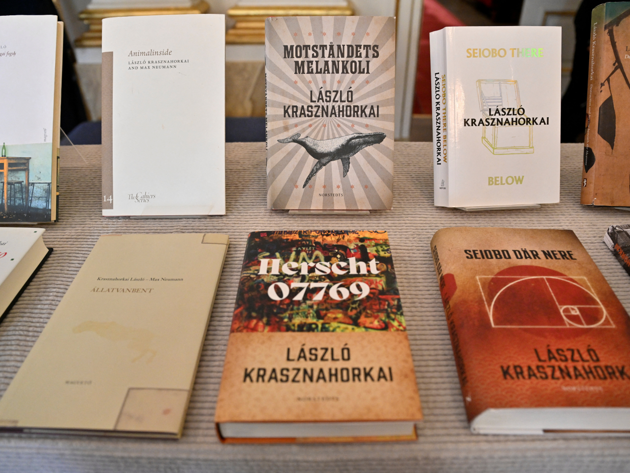 Books by Hungarian author Laszlo Krasznahorkai, who was awarded the 2025 Nobel Prize in Literature. Photo: TT News Agency/Henrik Montgomery via Reuters