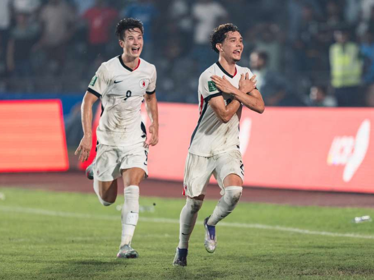 Raphael Merkies, right, bagged a sensational hat-trick to lift the SAR to a 4-3 away win against Bangladesh. Photo courtesy of the Football Association of Hong Kong, China