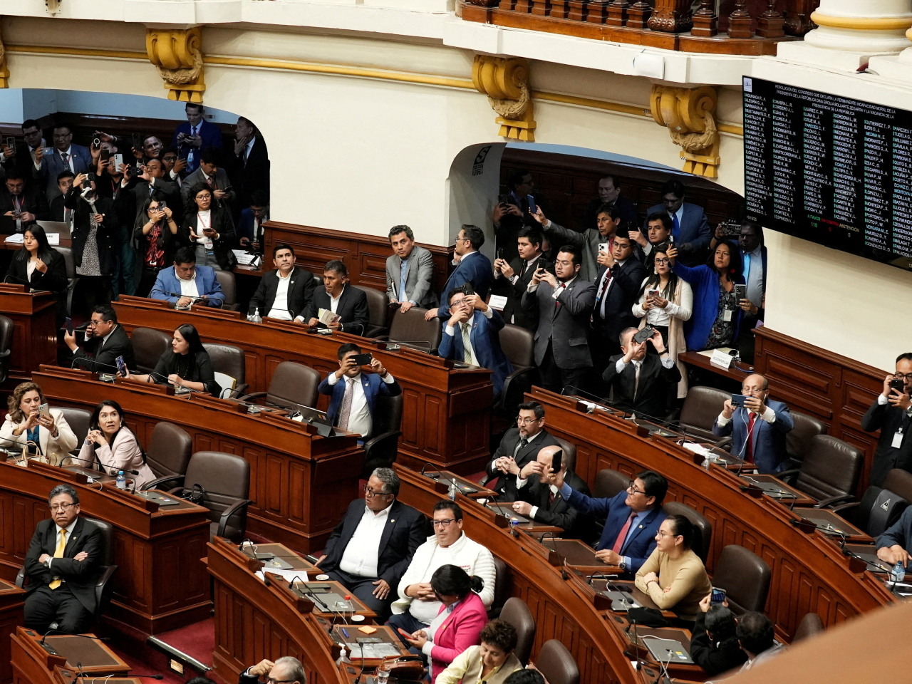 The scene in Congress after lawmakers voted to impeach Peru's President Dina Boluarte, in Lima. Photo: Reuters