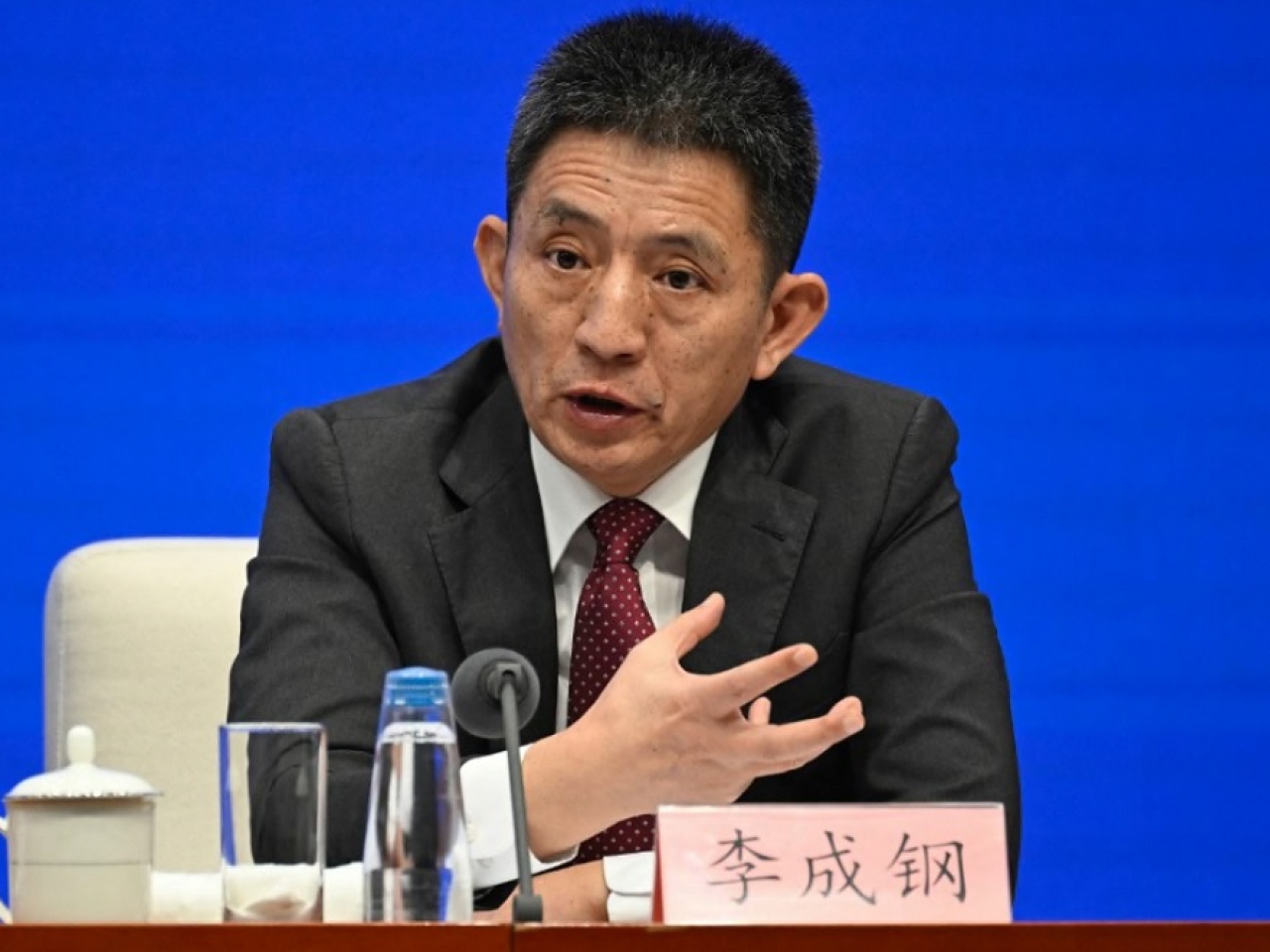 李成鋼說，各方應支持多邊貿易體制和自由貿易，克制使用貿易限制措施。（法新社資料圖片）