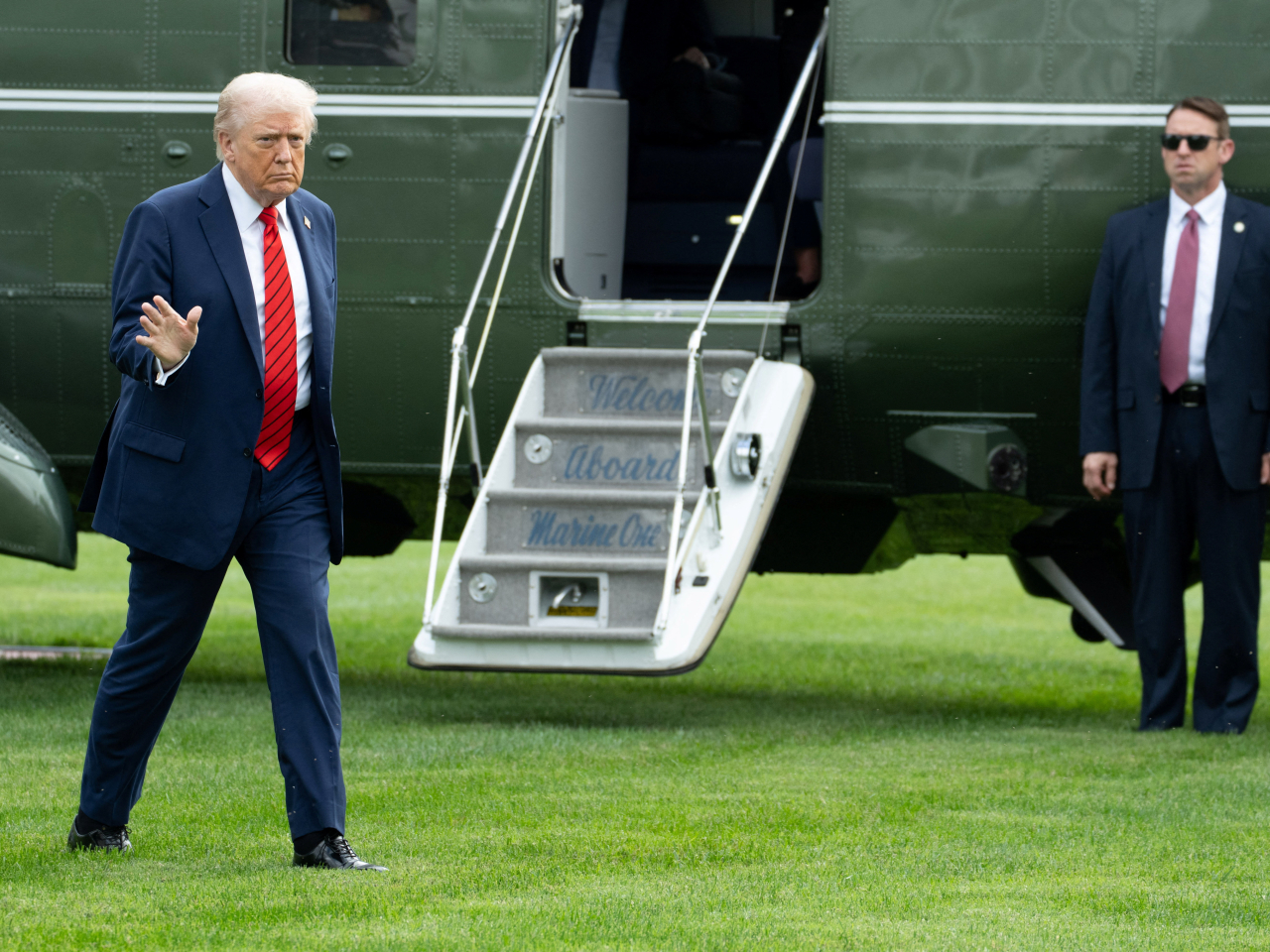 US President Donald Trump arrives back at the White House following his physical exam. Photo: Reuters