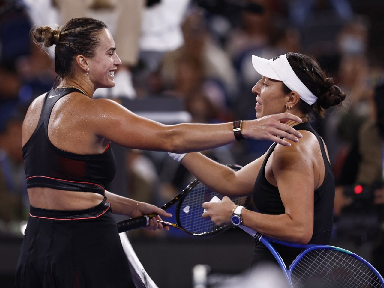 Jessica Pegula of the US hugs Belarus' Aryna Sabalenka after winning their semi final match. Photo: Reuters