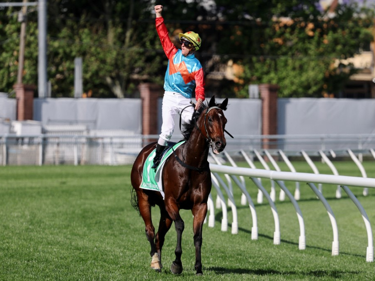 Zac Purton celebrates the 2025 win astride Ka Ying Rising at the Royal Randwick racecourse in Sydney. Photo: AFP