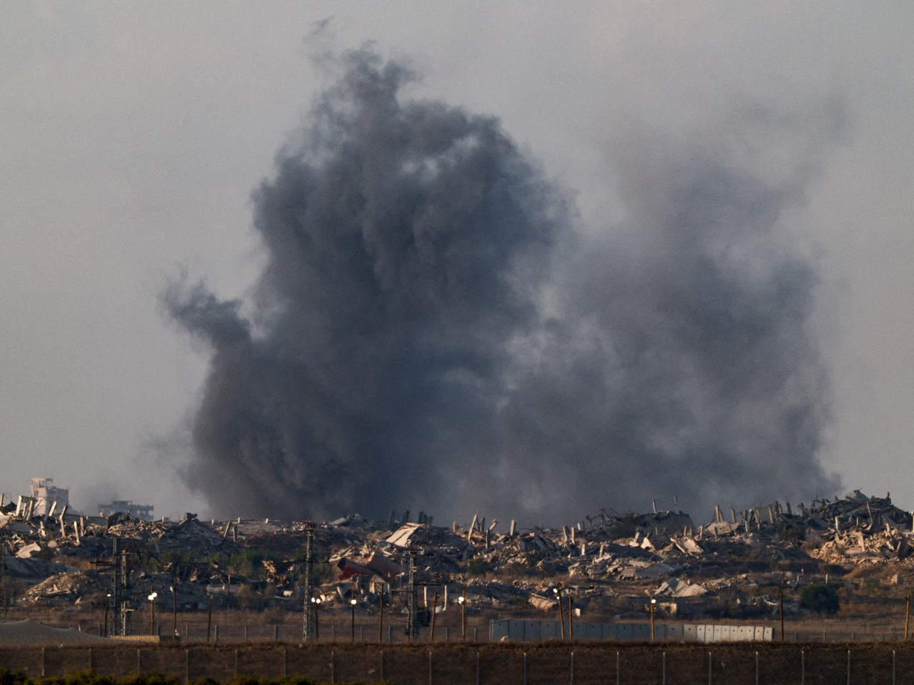 Smoke rises from Gaza following an explosion, as seen from Israel. Photo: Reuters