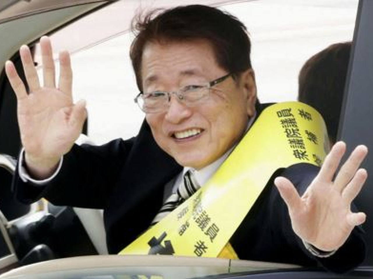 Taku Yamamoto says it is better for a partner to stay out of the spotlight, 'unlike in the West'. File photo: Reuters
